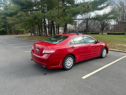 Red 2010 Toyota Camry LE