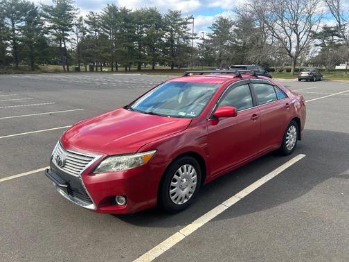 Red 2010 Toyota Camry LE