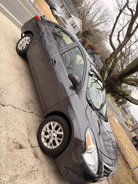 Gray 2015 Nissan Versa 1.6 S+
