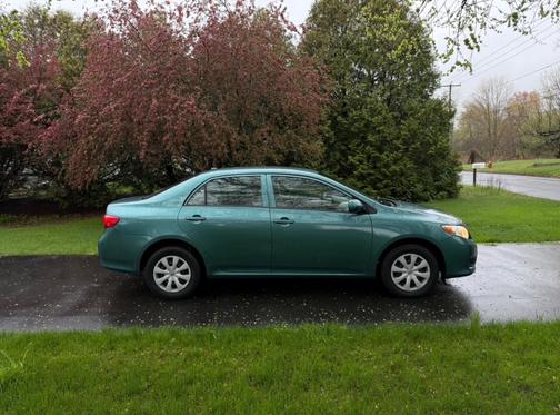 Green 2010 Toyota Corolla LE