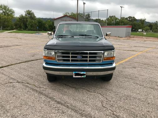 Blue 1992 Ford F-150 Custom SuperCab