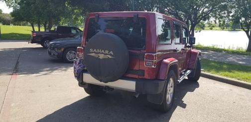 Purple 2011 Jeep Wrangler Unlimited Sahara