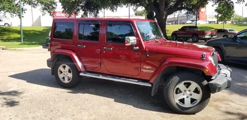 Purple 2011 Jeep Wrangler Unlimited Sahara