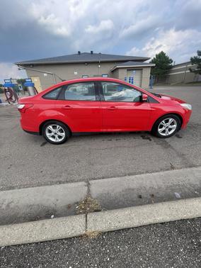 Red 2014 Ford Focus SE