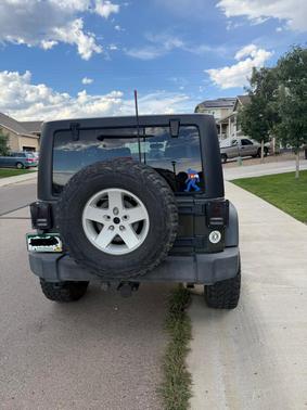 Green 2015 Jeep Wrangler Unlimited Sport