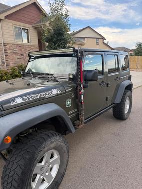 Green 2015 Jeep Wrangler Unlimited Sport
