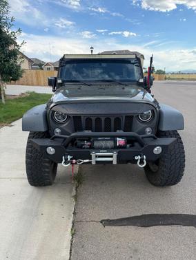 Green 2015 Jeep Wrangler Unlimited Sport