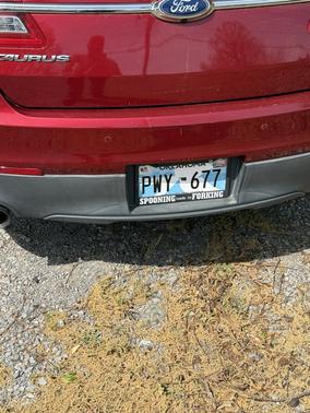 Red 2013 Ford Taurus SHO