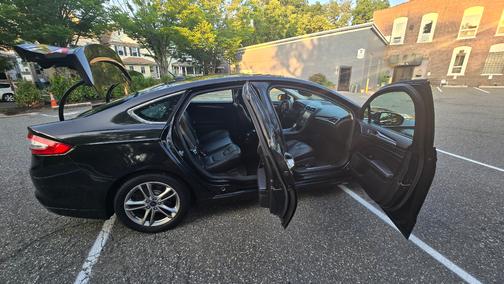 Black 2015 Ford Fusion Hybrid Titanium