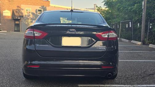 Black 2015 Ford Fusion Hybrid Titanium