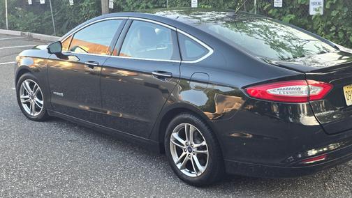 Black 2015 Ford Fusion Hybrid Titanium