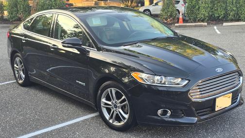 Black 2015 Ford Fusion Hybrid Titanium