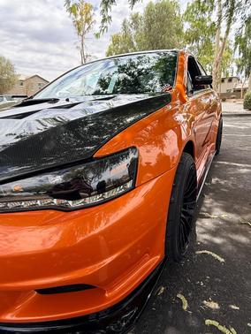 Orange 2014 Mitsubishi Lancer Evolution GSR