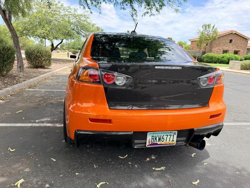 Orange 2014 Mitsubishi Lancer Evolution GSR