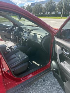 Red 2017 Nissan Rogue SL