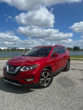 Red 2017 Nissan Rogue SL