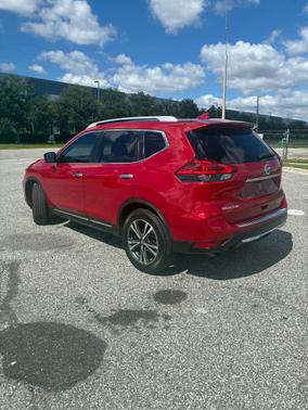 Red 2017 Nissan Rogue SL