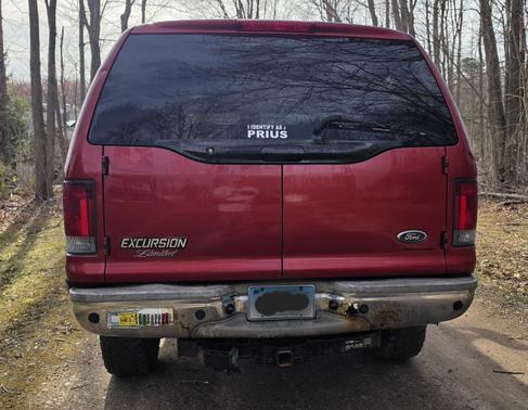 Red 2002 Ford Excursion Limited Ultimate