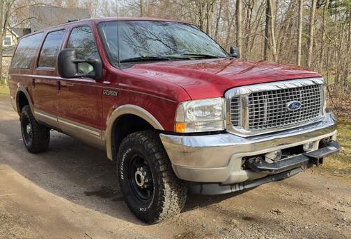 Red 2002 Ford Excursion Limited Ultimate