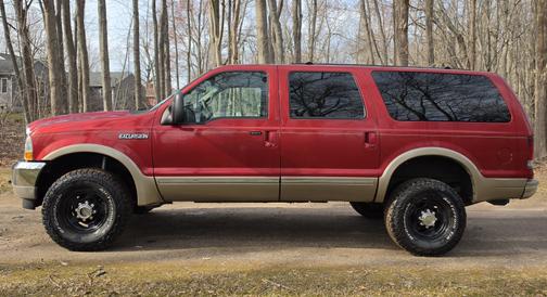 Red 2002 Ford Excursion Limited Ultimate