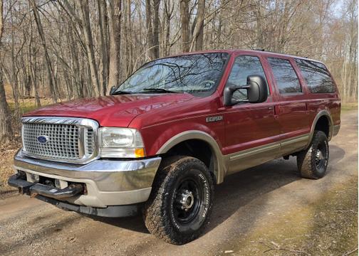 Red 2002 Ford Excursion Limited Ultimate