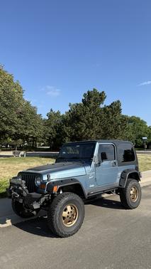 Blue 1999 Jeep Wrangler Sport