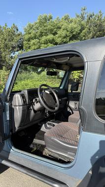 Blue 1999 Jeep Wrangler Sport