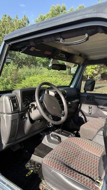 Blue 1999 Jeep Wrangler Sport