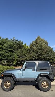 Blue 1999 Jeep Wrangler Sport