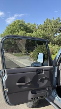 Blue 1999 Jeep Wrangler Sport