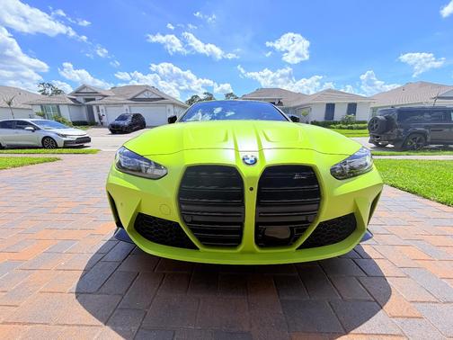 Yellow 2025 BMW M4 Competition xDrive