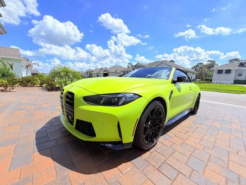 Yellow 2025 BMW M4 Competition xDrive