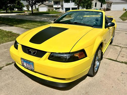 Yellow 2001 Ford Mustang GT