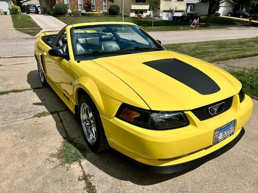 Yellow 2001 Ford Mustang GT