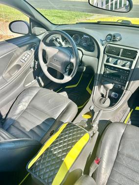 Yellow 2001 Ford Mustang GT