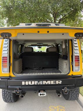 Yellow 2003 Hummer H2 Base