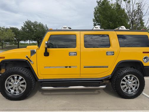 Yellow 2003 Hummer H2 Base