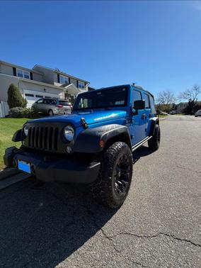 Blue 2016 Jeep Wrangler Unlimited Sport