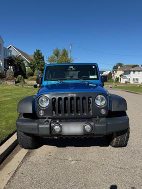 Blue 2016 Jeep Wrangler Unlimited Sport