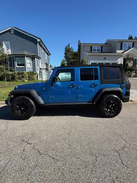 Blue 2016 Jeep Wrangler Unlimited Sport