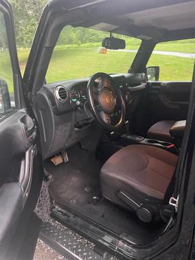 Black 2014 Jeep Wrangler Unlimited Sport