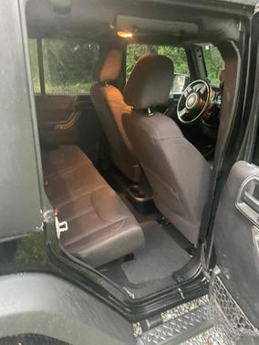 Black 2014 Jeep Wrangler Unlimited Sport