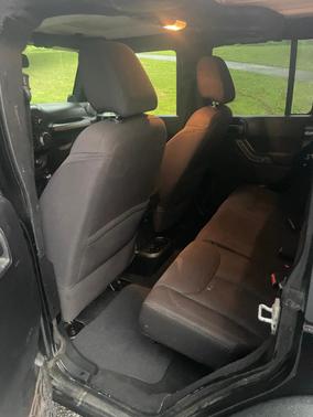Black 2014 Jeep Wrangler Unlimited Sport