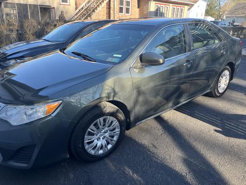 Green 2014 Toyota Camry LE