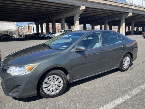Green 2014 Toyota Camry LE
