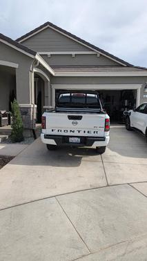 White 2023 Nissan Frontier SV