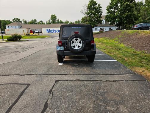 Black 2011 Jeep Wrangler Unlimited Sport