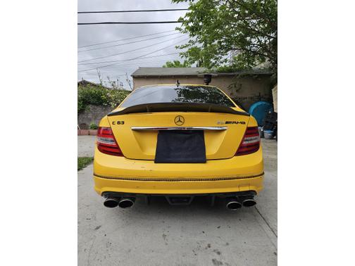 Yellow 2009 Mercedes-Benz C-Class C 63 AMG