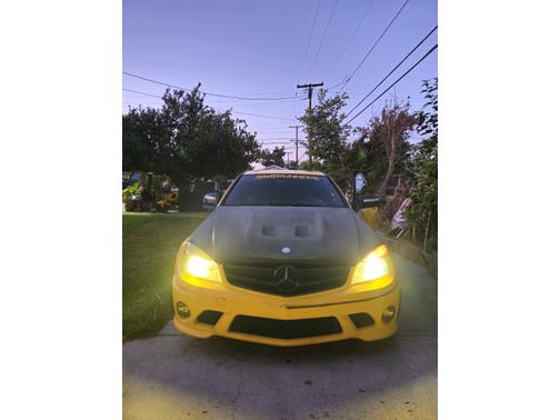 Yellow 2009 Mercedes-Benz C-Class C 63 AMG