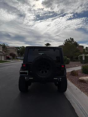 Black 2016 Jeep Wrangler Unlimited Sport